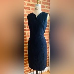Gorgeous fully lined navy dress with front pockets. In mint condition.